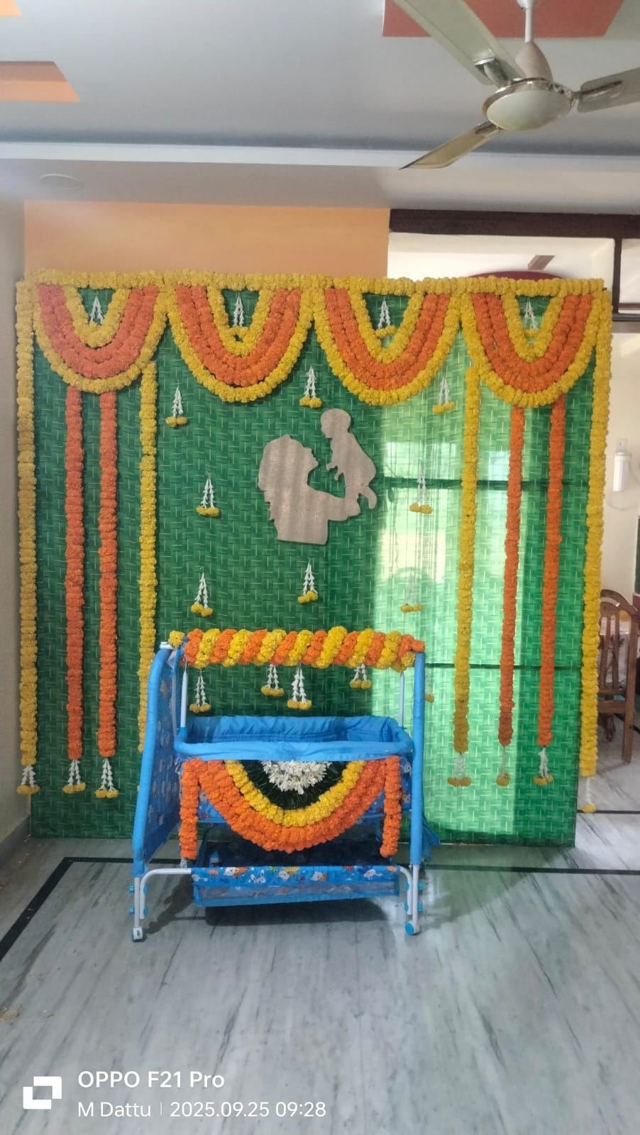 Cradle ceremony decoration with marigold garlands