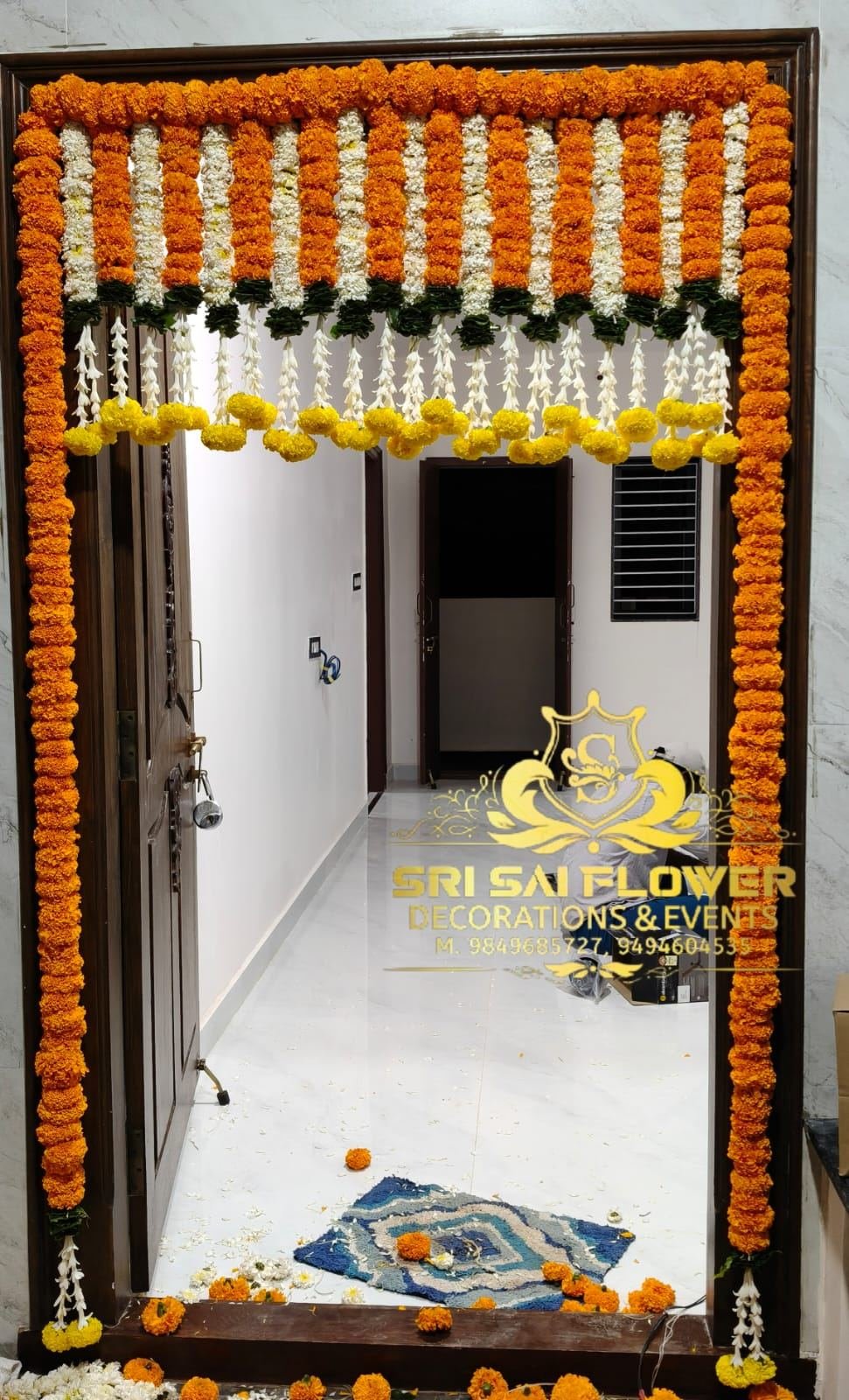 Home entrance marigold floral decoration