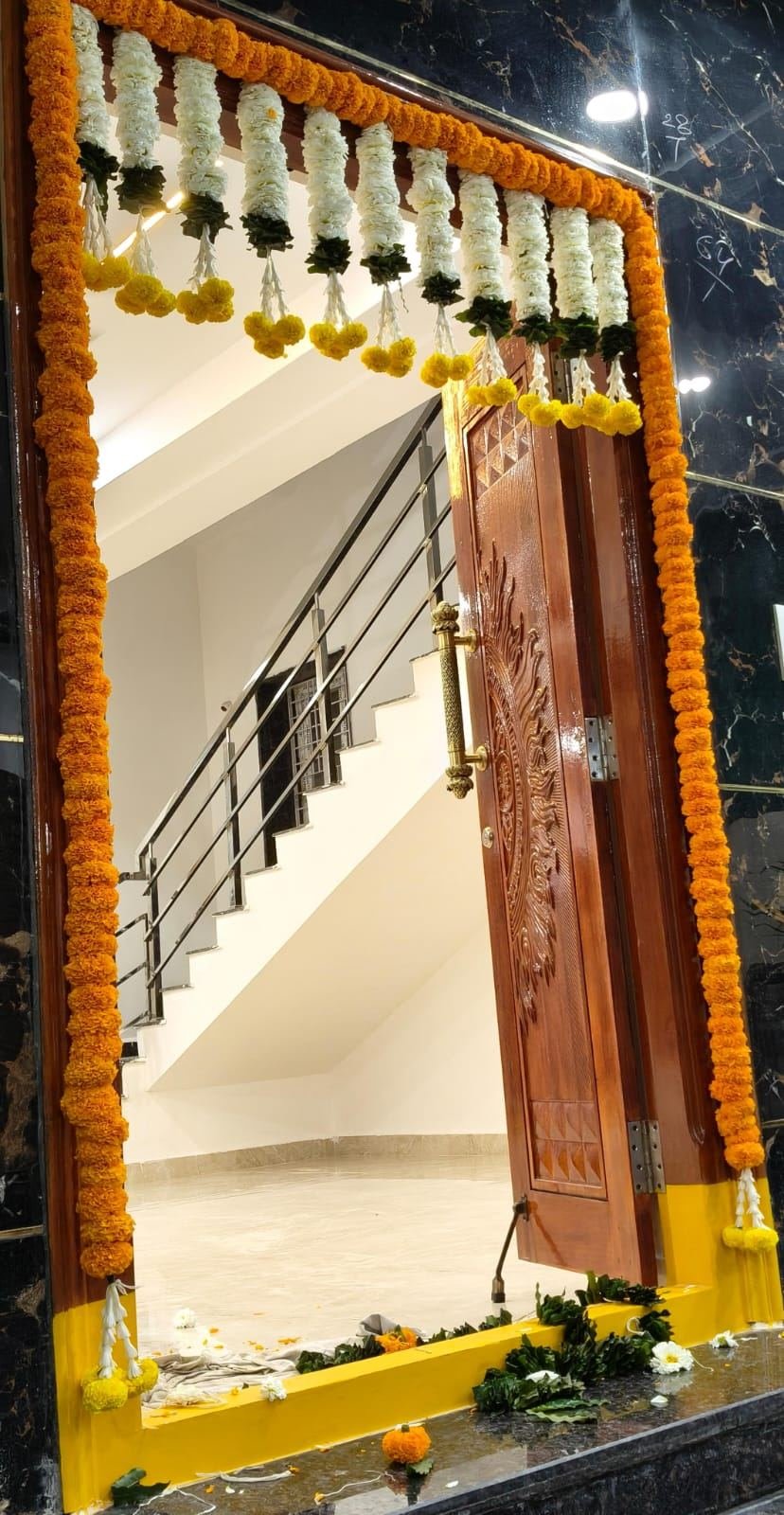 Marigold doorway decoration with hanging tassels