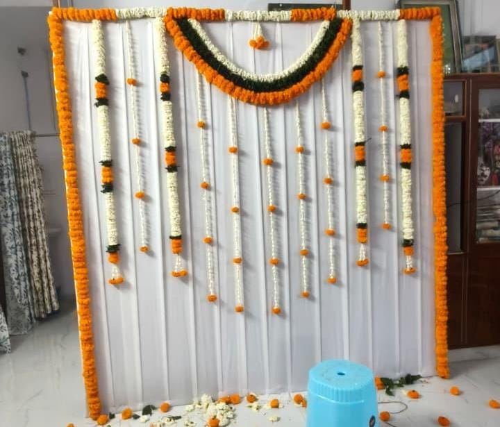Marigold and jasmine wall hanging decoration for housewarming
